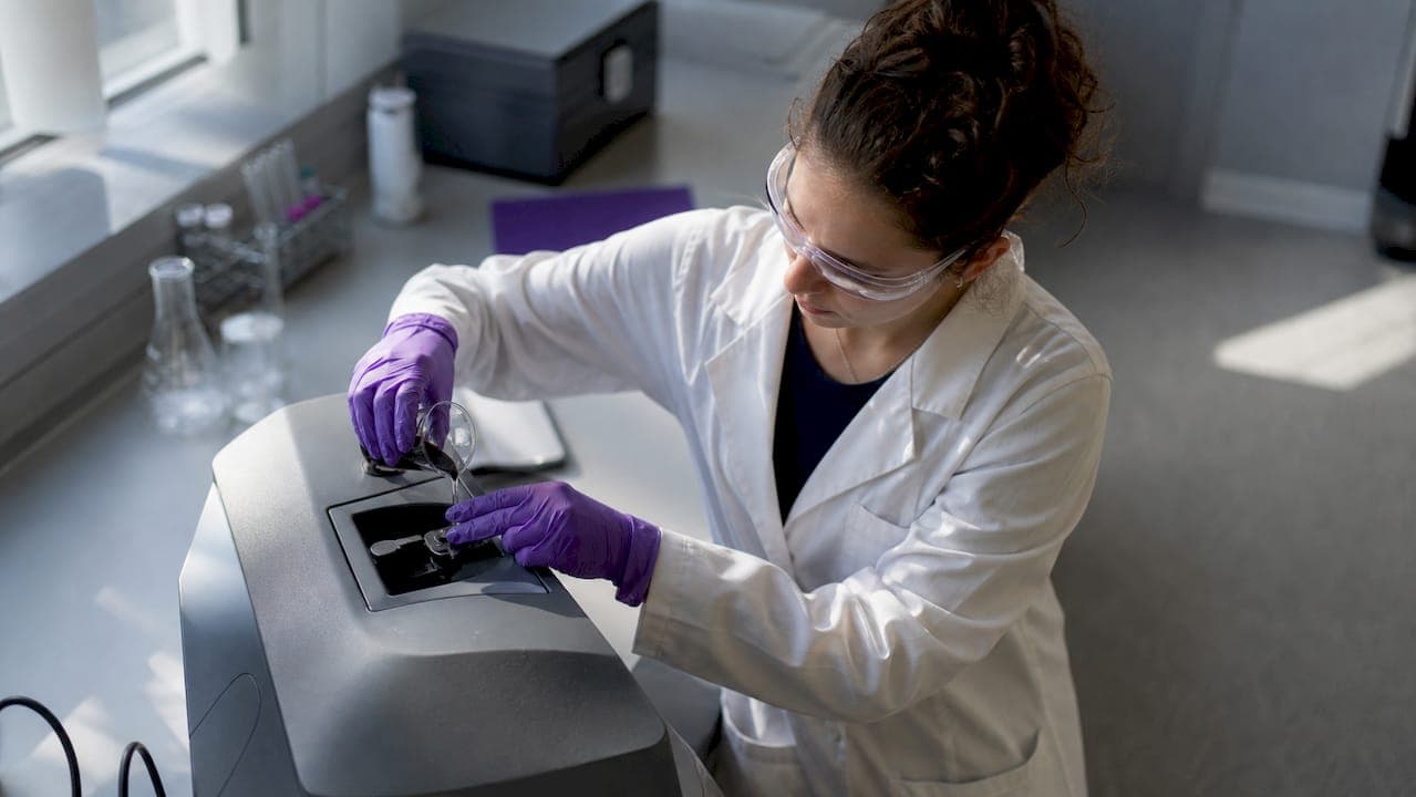 Lab technician preparing dispersion quality test